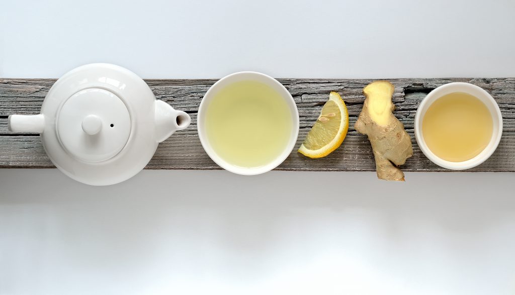Ginger lemon tea concept, top view with some free space